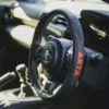 COUVRE-VOLANT PART NOIR/ROUGE - ARTA